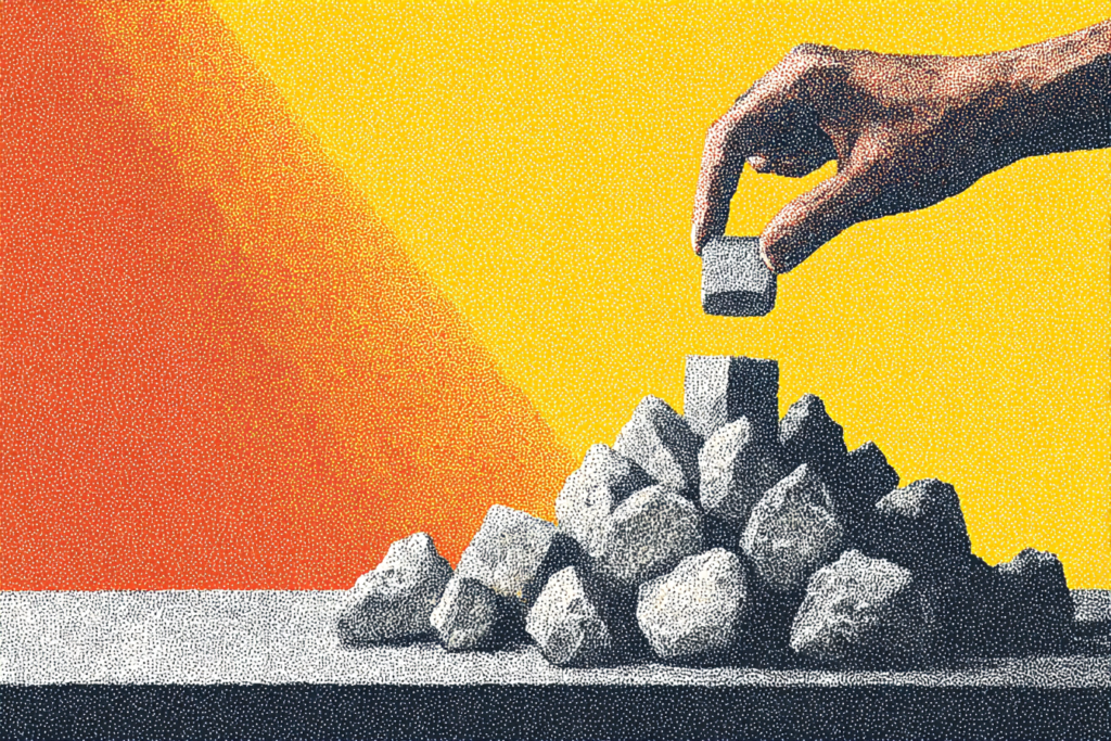 Illustration of a hand placing a stone block onto a pile of building blocks against a red and yellow background
